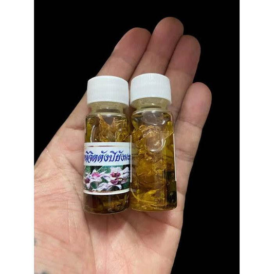 100 Loves Charm Oil - Ultimate Attraction, Fortune & Success This sacred oil is meticulously crafted using ancient Lanna mystical formulas to enhance charisma, attract wealth, and ensure smooth business dealings. - One-Sake.com